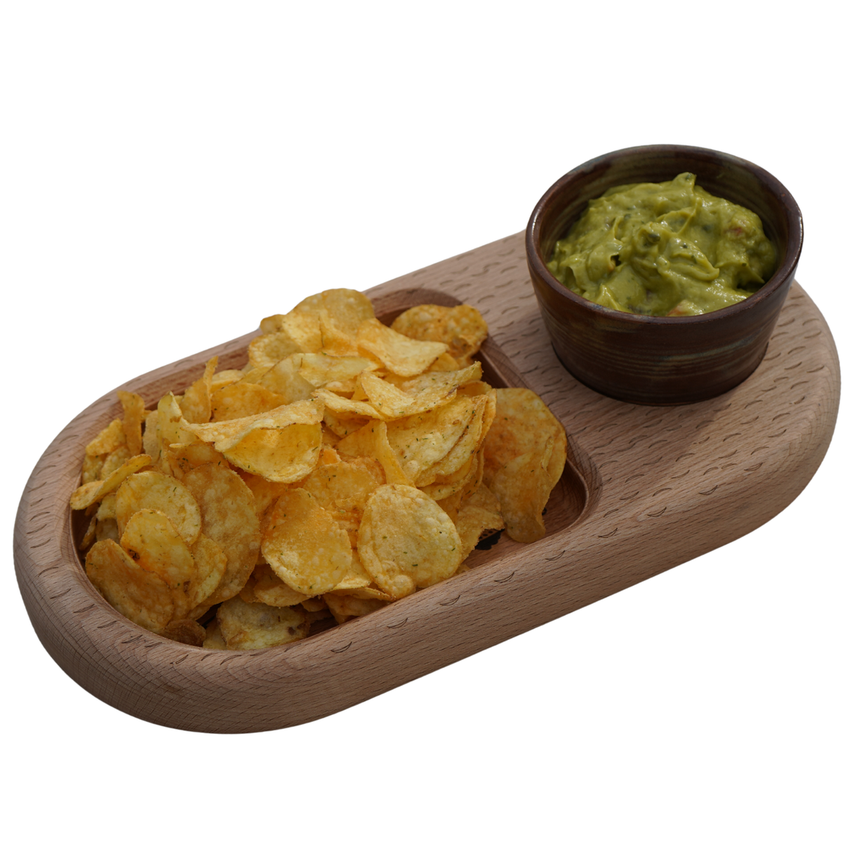 Wooden platter with potato chips and a bowl of guacamole on a white background