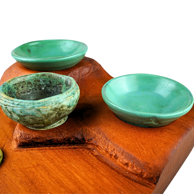 Osage with six stoneware pots