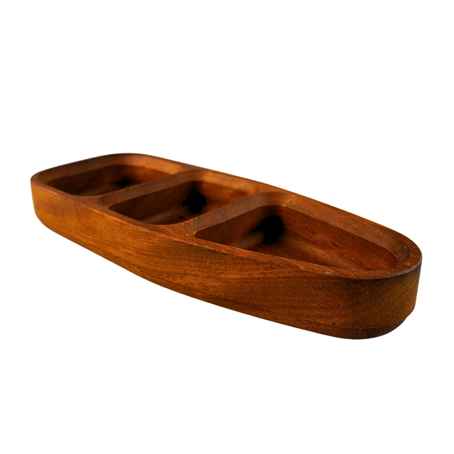Wooden tray with compartments on a white background