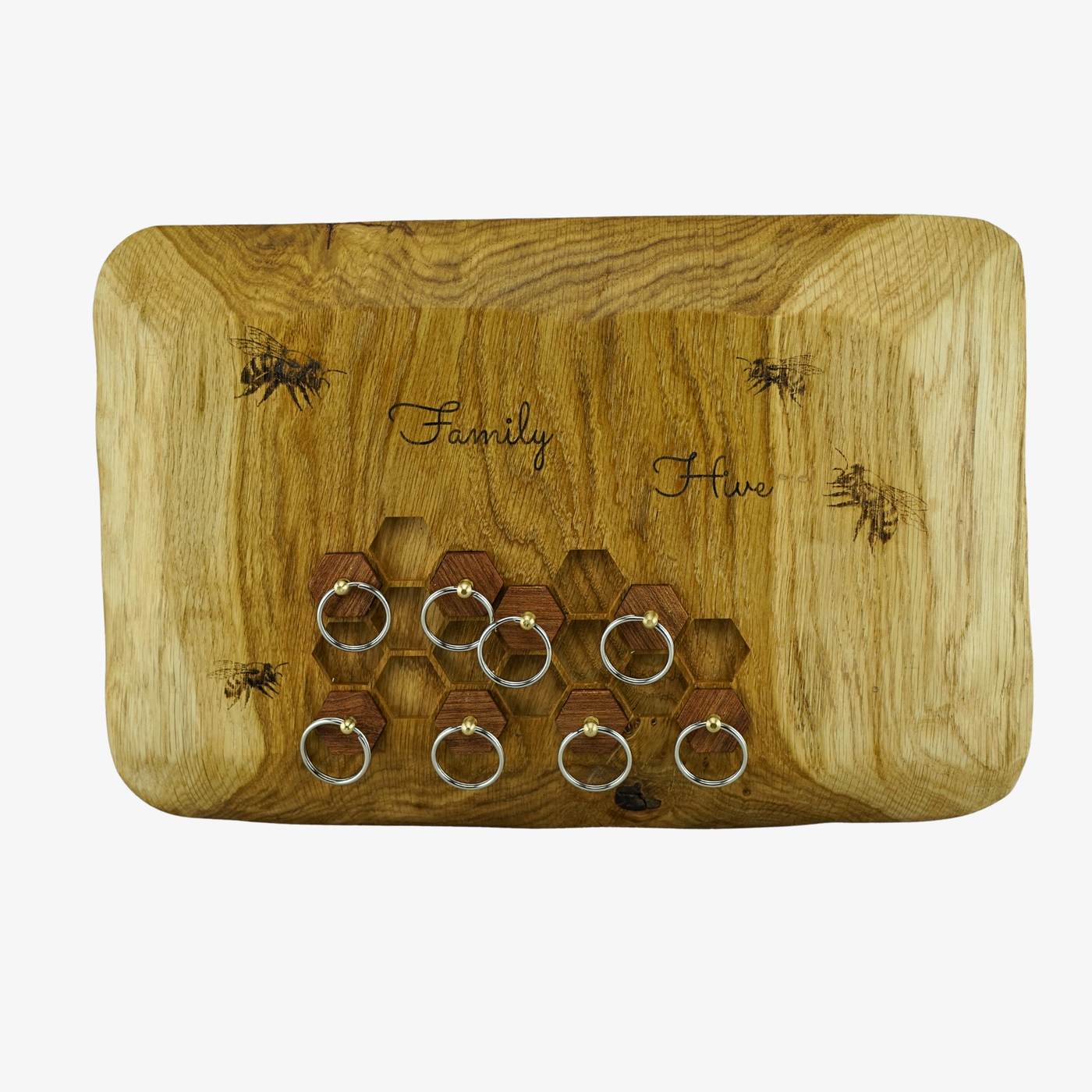 Wooden Key holder with key rings and 'Family Hive' and bees engraving on a white background