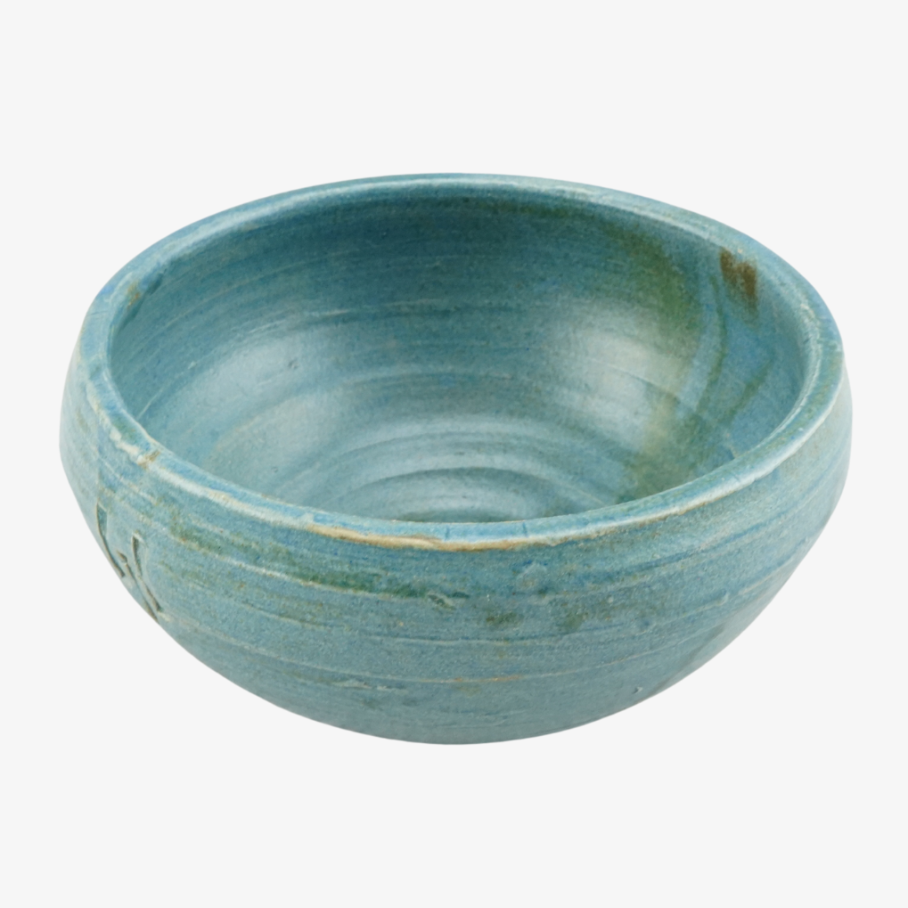 Blue ceramic bowl on a white background