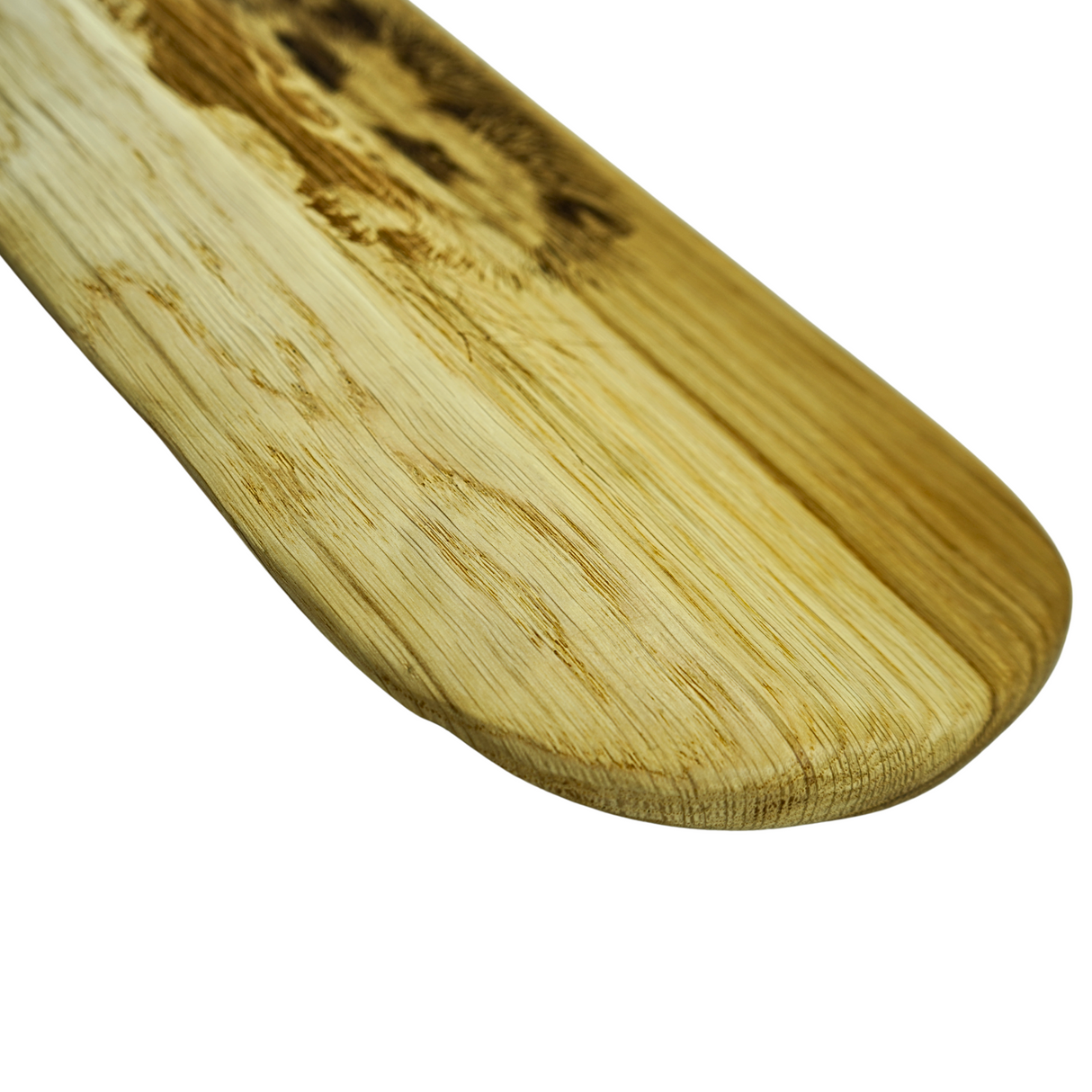 Close-up of a wooden spatula on a white background