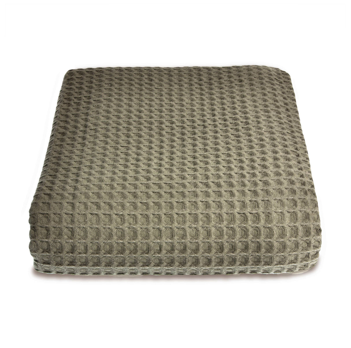 Textured green throw on white background