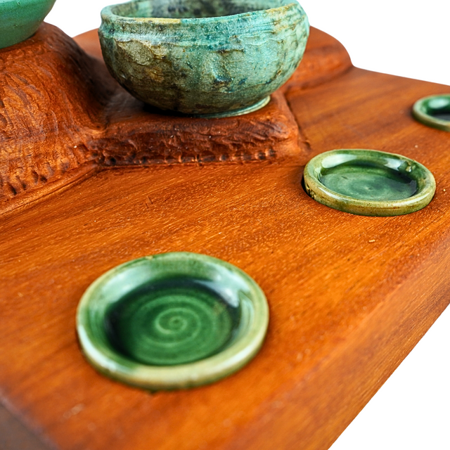 Osage with six stoneware pots