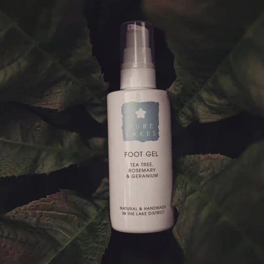Foot gel bottle on a leafy background