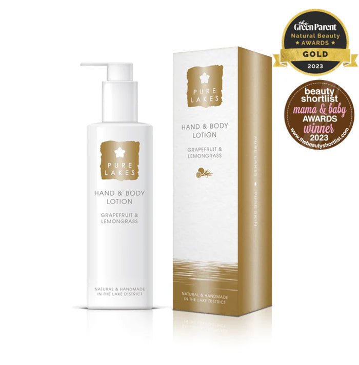 Hand and body lotion with packaging and awards on a white background