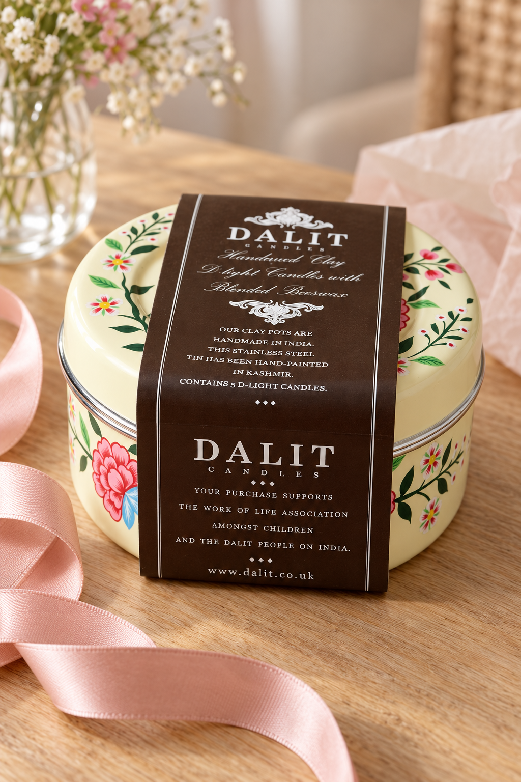 Gift set containing five hand-poured candles in terracotta pots and one reusable white hand-painted stainless steel tin. Candles are handmade by members of the Dalit community in India and scented with lavender and a subtle hint of vanilla