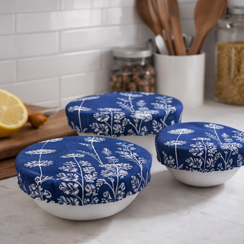 blue patterned lids on white bowls in various settings.