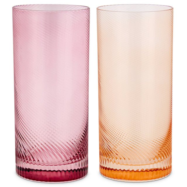 Two twist textured glass tumblers, one pink and one orange, on a white background.