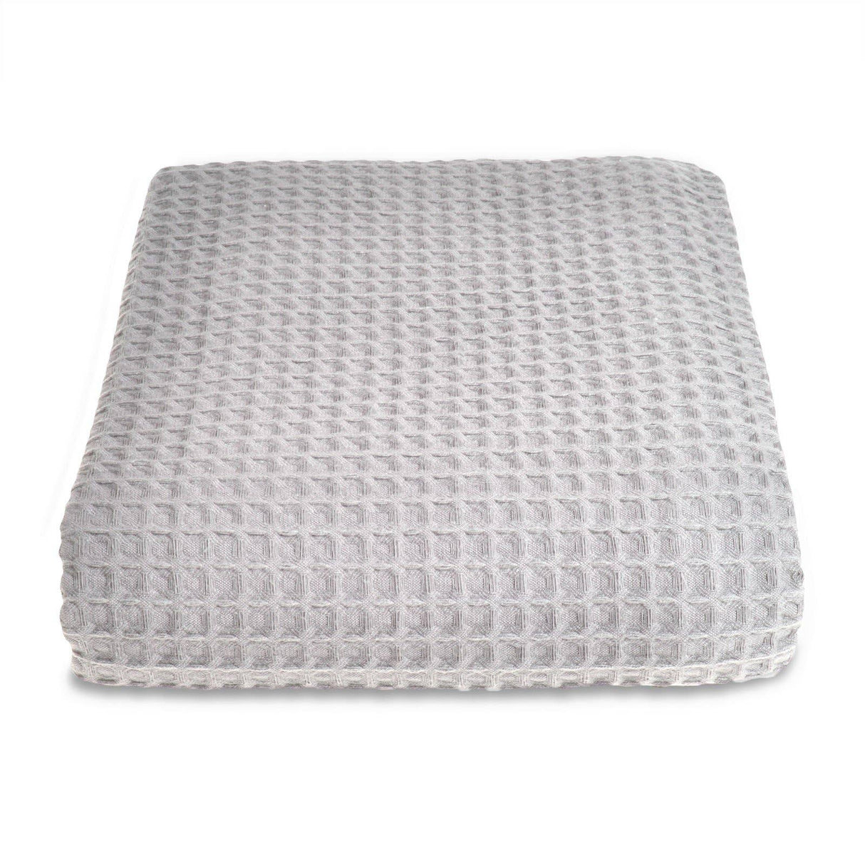 Grey textured ottoman on a white background
