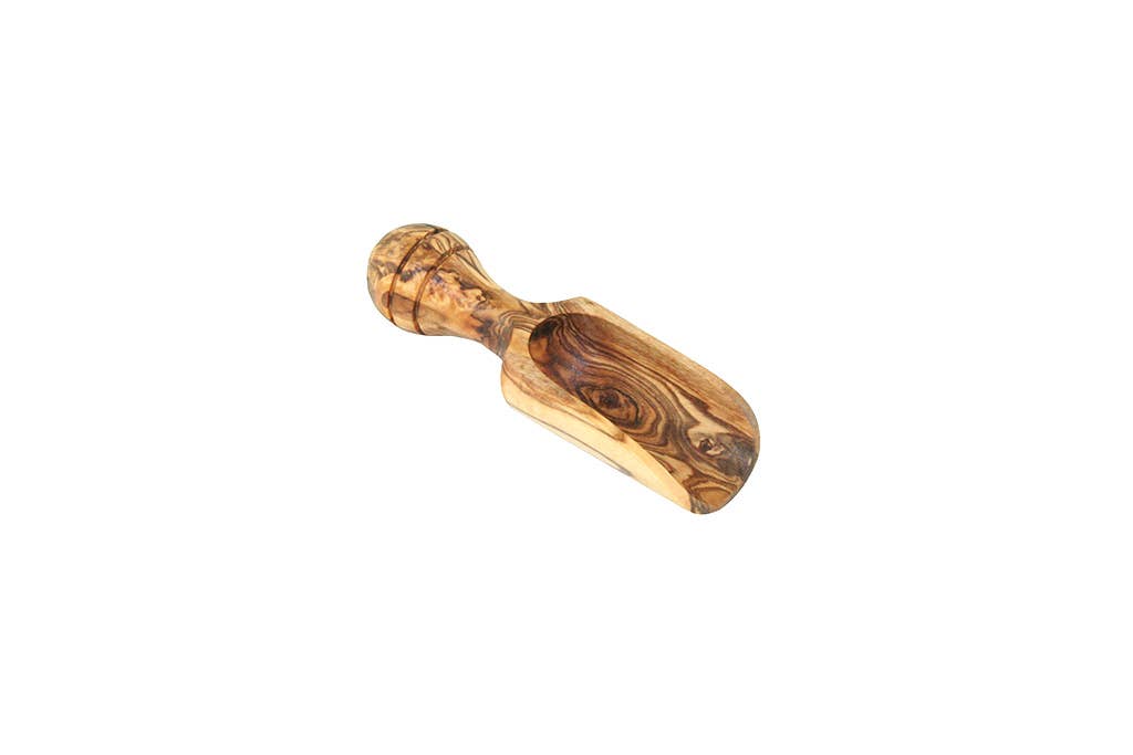 wooden salt spoon a white background