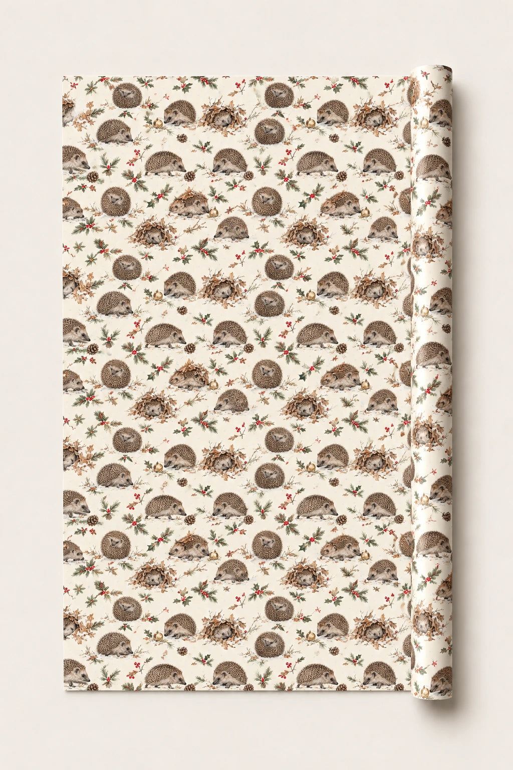 Hedgehog Christmas wrapping paper roll with brown hedgehogs, holly and pine cones on a cream background.