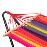 Colorful striped hammock with wooden bars on a white background