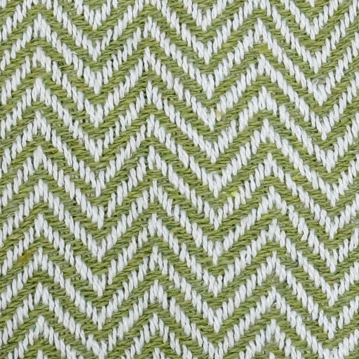 Textile pattern with green and white chevron design