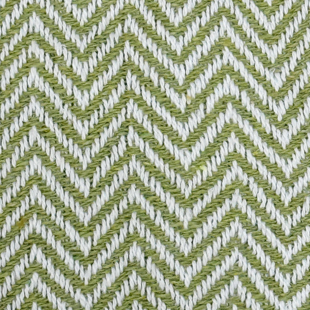 Textile pattern with green and white chevron design