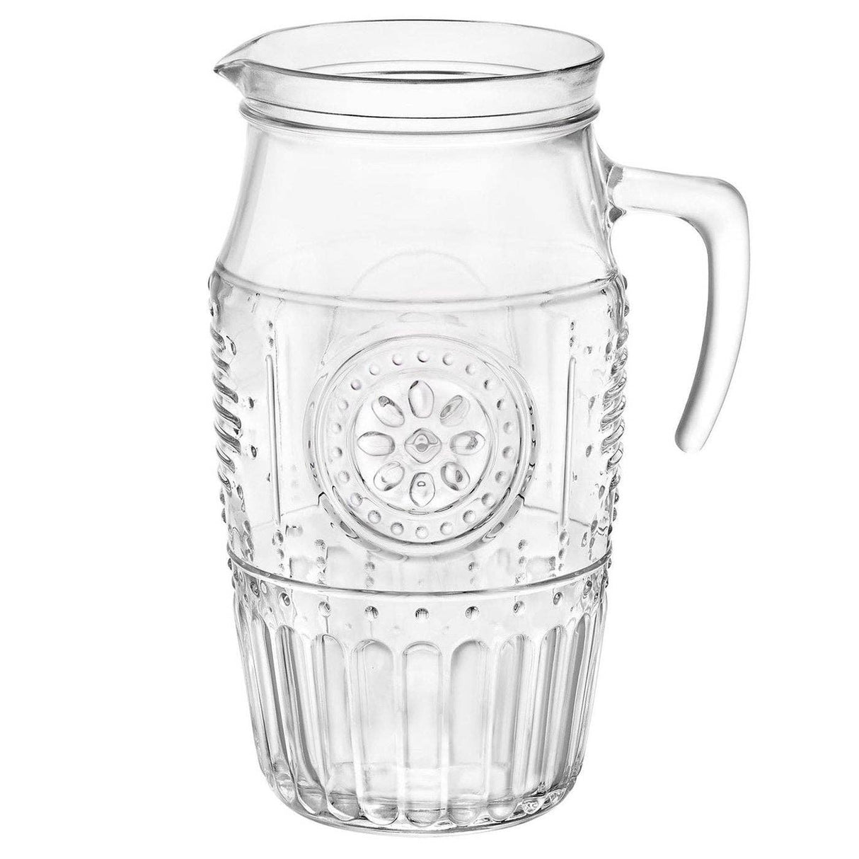 Clear glass pitcher with decorative embossing on a white background
