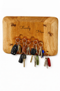 Wooden key holder with keys attached, featuring the word 'Family' and bee illustrations.