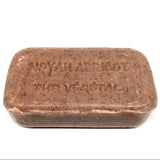 Bar of soap with branding on a white background
