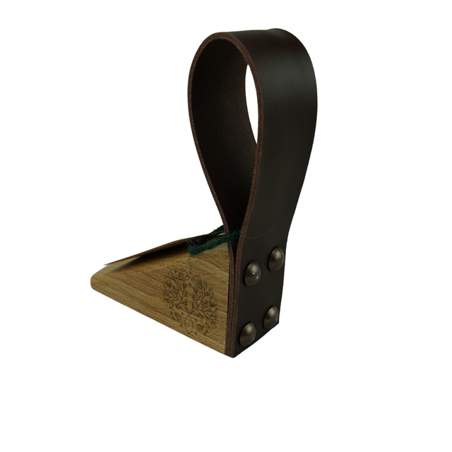 Oak Doorstop with leather handle and floral engraving
