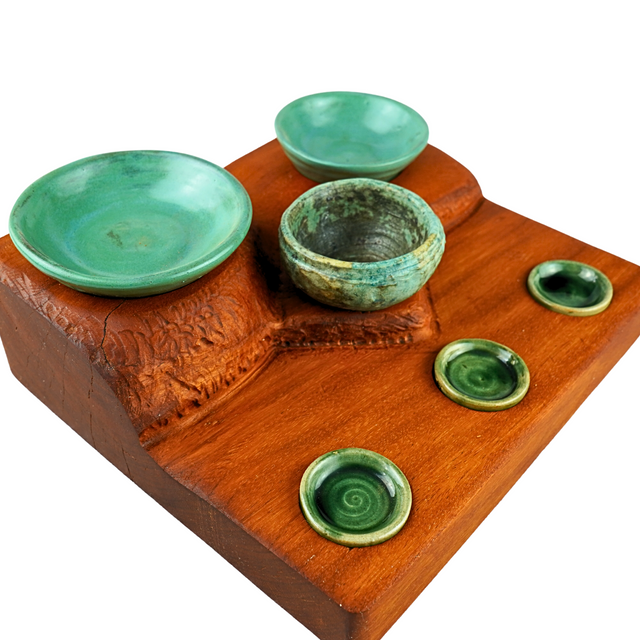 Osage with six stoneware pots