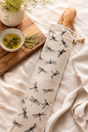 Natural linen baguette bag with black Dragonfly print, cotton drawstring, wooden toggle and hanging loop, hand printed and made in Derbyshire for storing French sticks and baguettes.