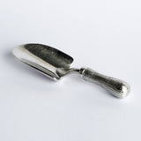 Silver gardening trowel on a white background