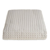 Textured grey throw on a white background
