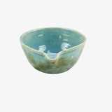 Blue ceramic bowl on a white background