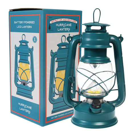 Teal battery-powered LED hurricane lantern with packaging on a white background