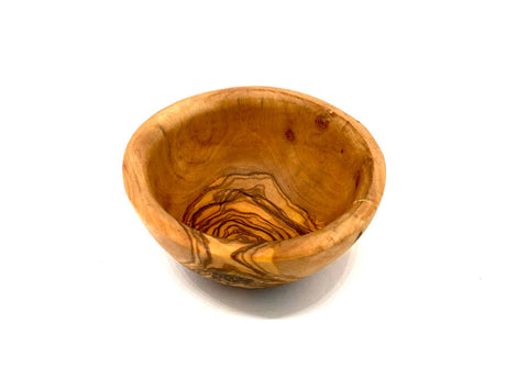 Wooden bowl with natural patterns on a white background