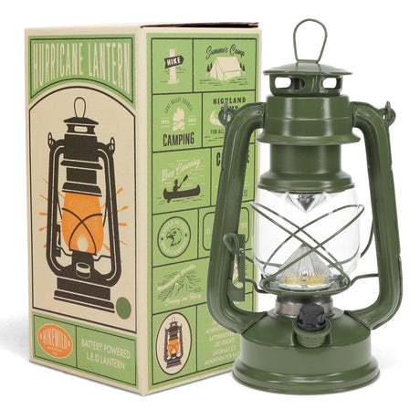Green hurricane lantern with packaging in the background
