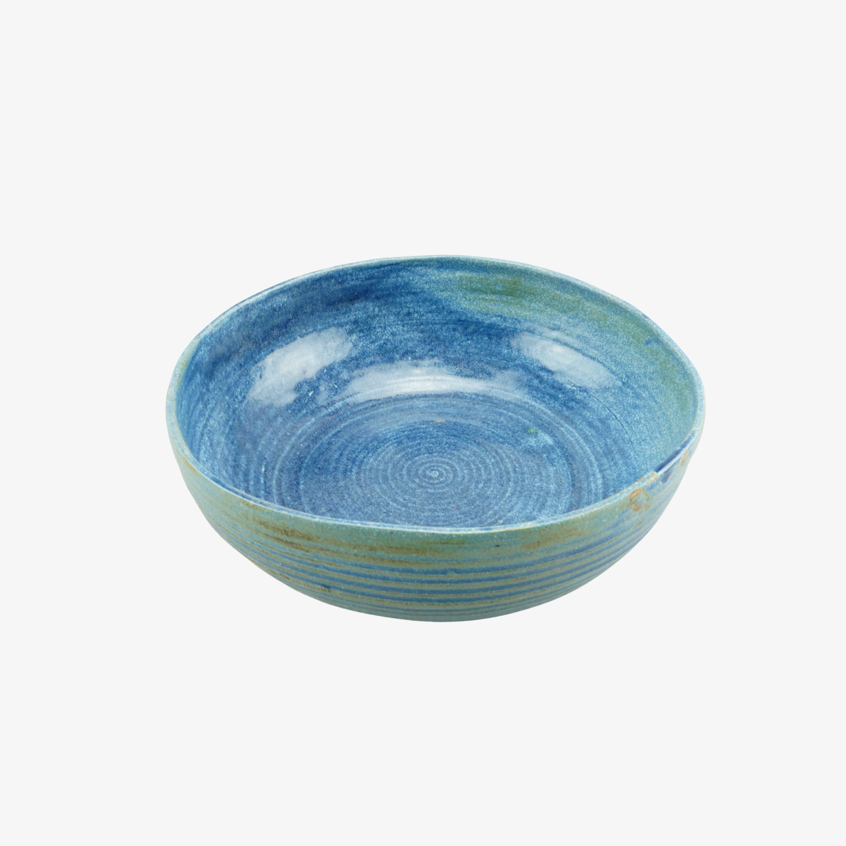 Blue stoneware bowl on a white background