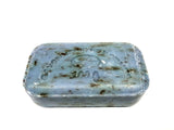 Rectangular soap with visible branding on a white background
