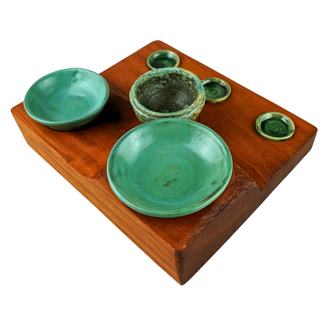 Osage with six stoneware pots