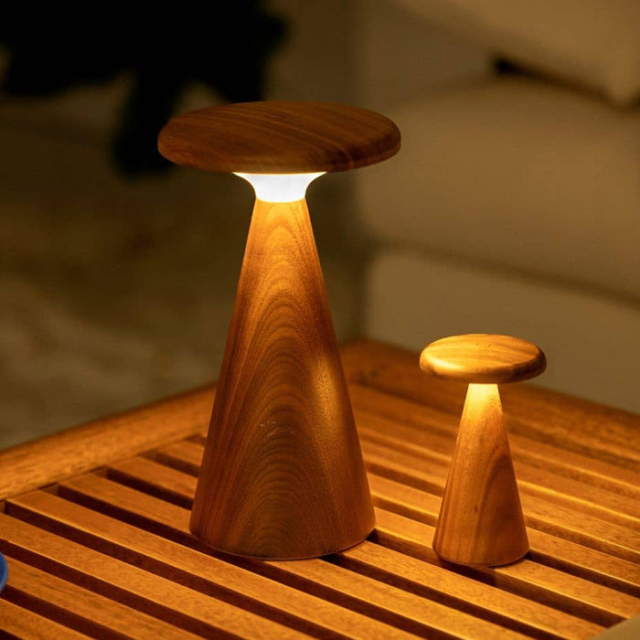 Wooden lamp on a wooden surface with a blurred background