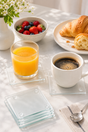 A set of 4 clear glass coasters with a clean square shape, made from toughened tempered glass 