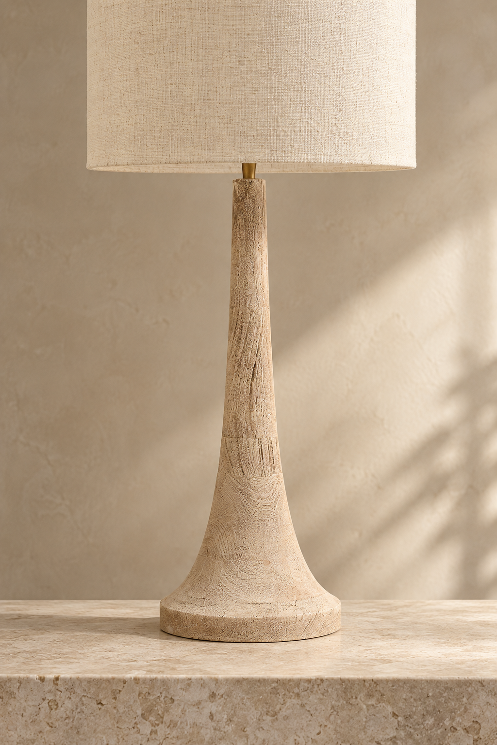 Cream linen drum shade on the Backwell wooden table lamp