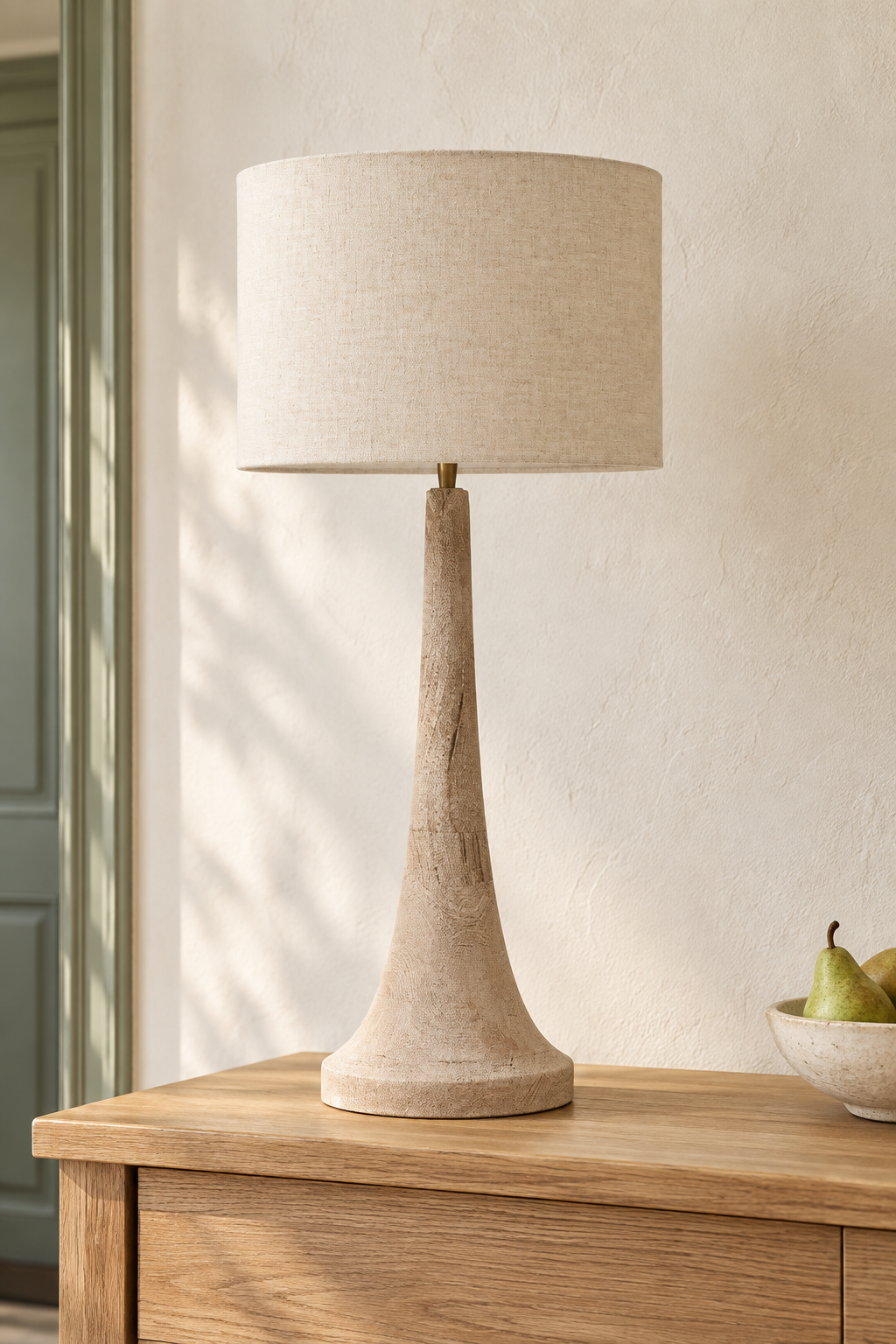 Natural grain and sandblasted texture on the Backwell mango wood lamp base 