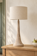 Natural grain and sandblasted texture on the Backwell mango wood lamp base 
