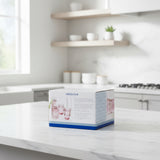 Box packaging for Uberstar with set of 4 pink stacking fish glasses on a white background