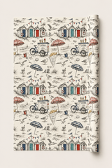 British seaside gift wrap with monochrome coastal illustration and subtle colour accents.
