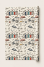 British seaside gift wrap with monochrome coastal illustration and subtle colour accents.