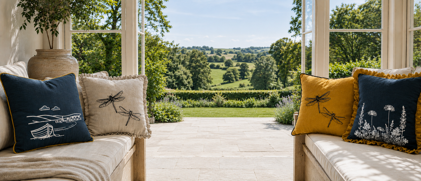 a view our the the countryside with linen cushions from byard's boutique range