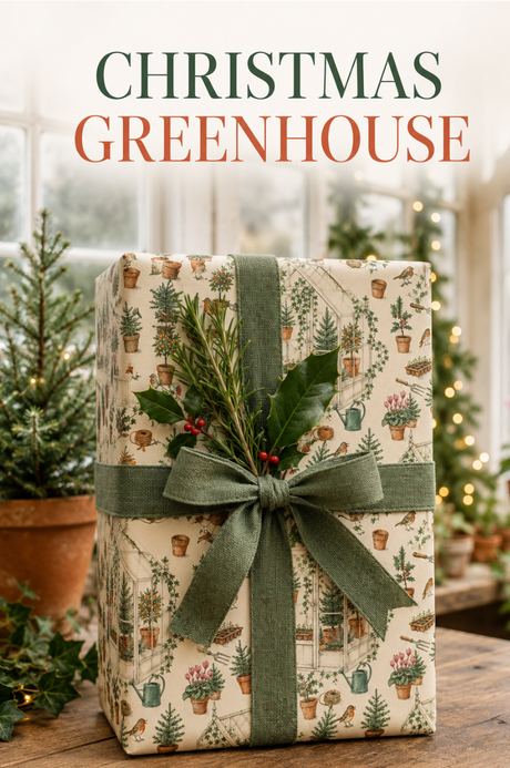 Illustrated Christmas wrapping paper featuring glasshouses, potted fir trees, holly, ivy, robins, terracotta pots, watering cans, hand forks, twine, seed trays, cyclamen and citrus trees. The pencil-sketch design uses muted green, terracotta, berry red, orange and pink on a warm ivory background.