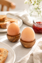 Compact natural olive wood breakfast egg holders