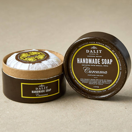Dalit handmade soap curcuma in a brown container on a beige background