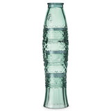 Decorative green glass tumblers with intricate fish patterns on a white background