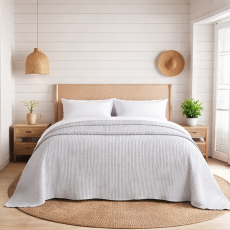 scandi bedroom with dove grey bed throw