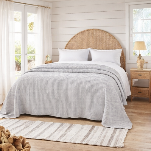 bedroom with dove grey bed throw