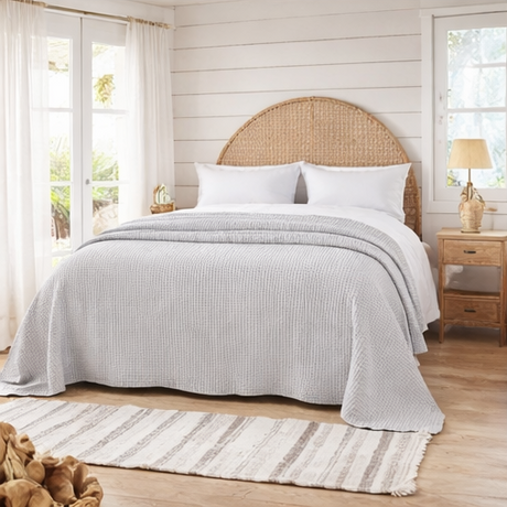bedroom with dove grey bed throw